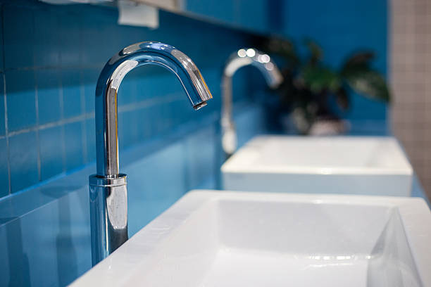 istock Faucet, sink in a department store bathroom. 2253066509