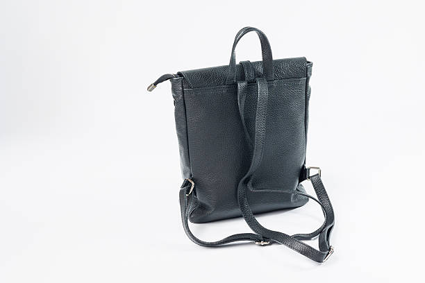 istock Black backpack women's bag, women's backpack, gray women's backpack. Women's bag isolated on white background. The bag is isolated on a white background. 2253066812