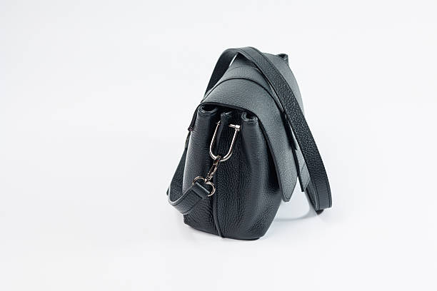 istock Small black leather women's bag on a white background. Lady's bag 2253067367