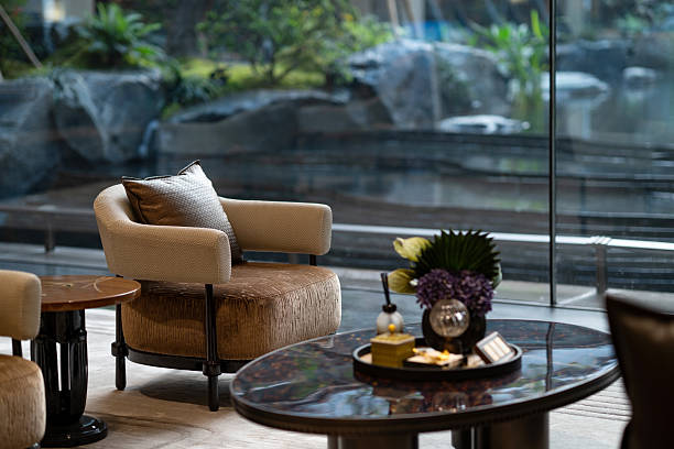istock Cozy armchairs in elegant lounge 2253069568