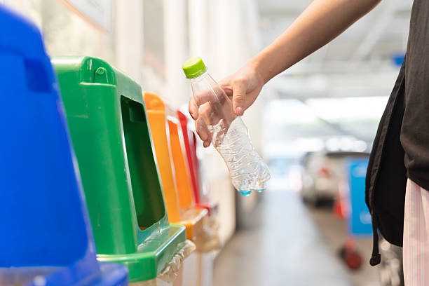 istock Plastic Bottle Recycling in Color Coded Bins, Sustainable Waste Sorting Concept 2253073148