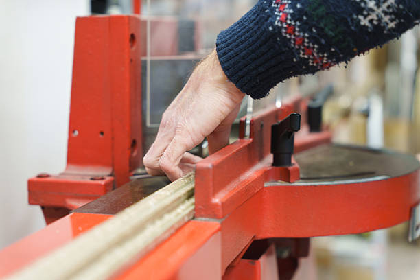 Electric jigsaw resting on plywood during home construction or renovation project