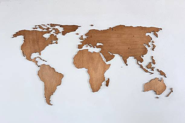 istock Wooden world map on the white wall 2253076733