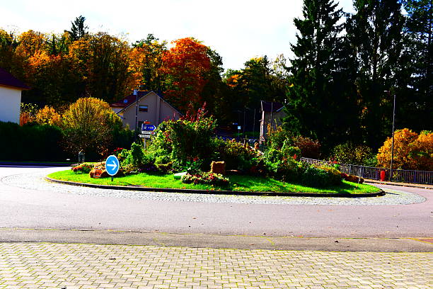 istock traffic circle in autumn colors 2253082568