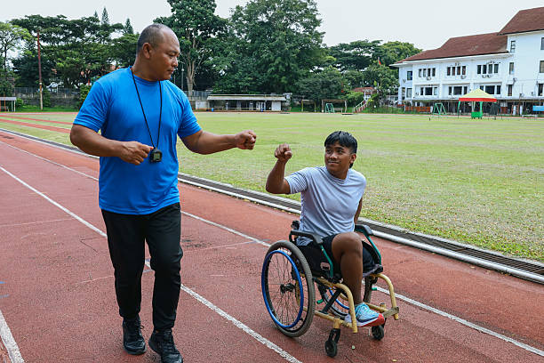 Wheelchair mid adult man contemplating on the public park