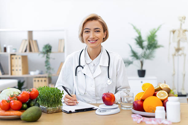 istock Nutritionist with Healthy Food 2253085987