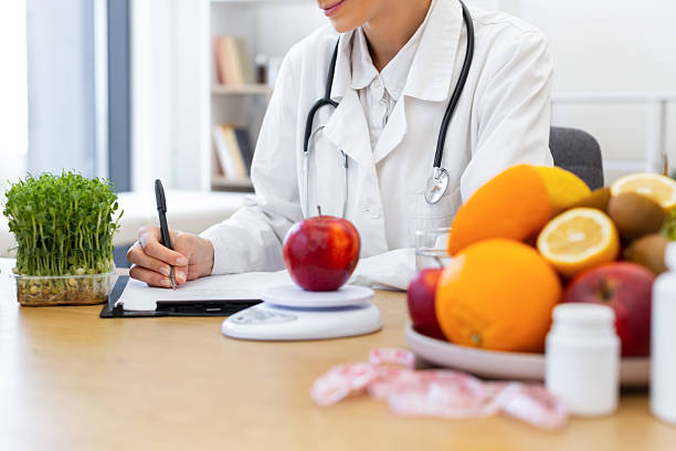 istock Dietitian with Healthy Food 2253086015