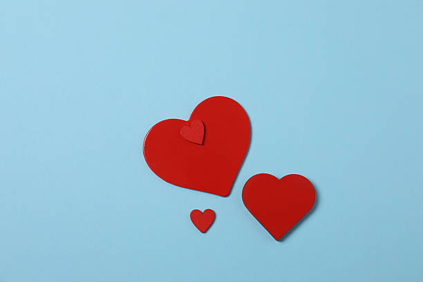 istock Valentine's Day banner with gift boxes surrounded by red hearts on a blue background. Perfect for romantic and festive events. 2253090658