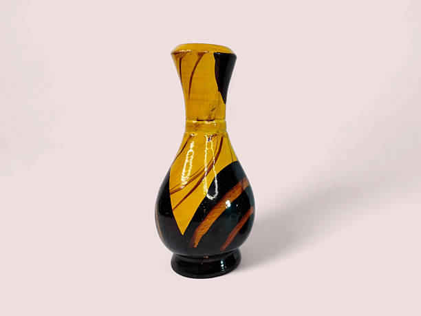 istock Decorative Patterned Yellow and Black Wooden Vase 2253091703