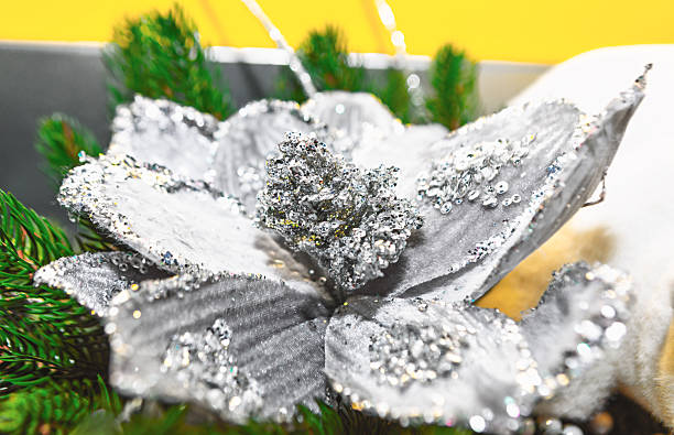 istock Glittering silver artificial flower with sequined petals 2253096543