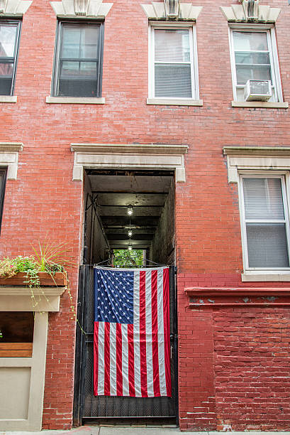 istock American flag in a entrance 2253099478