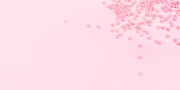 istock Pink background with tiny hearts. Valentine's day concept. 2253104298