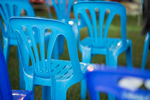 istock Rows of Bright Blue Plastic Chairs Outdoors. 2253106865