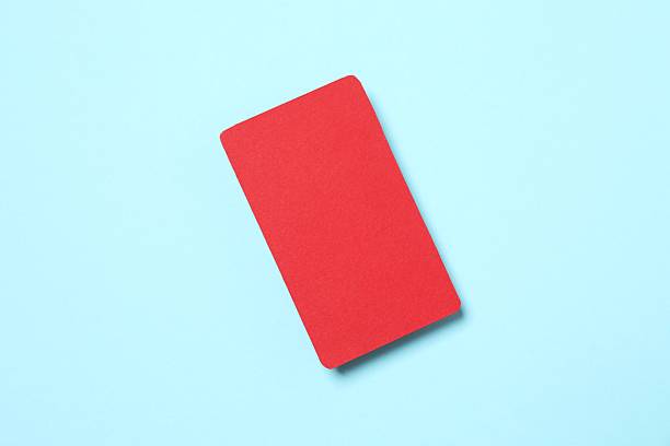 istock Red paper card on blue background 2253112531