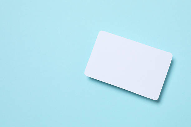 istock White paper card on blue background 2253112569