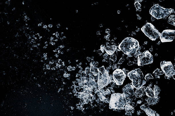 istock A pieces of crushed ice on a black background. 2253117844