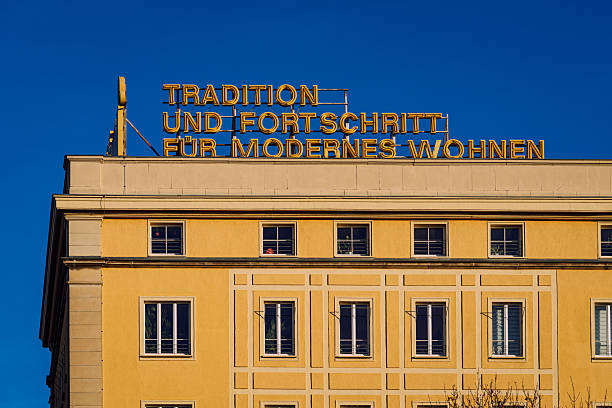 istock Tradition And Progress For Modern Living Building Sign in  Leipzig, Germany 2253117881