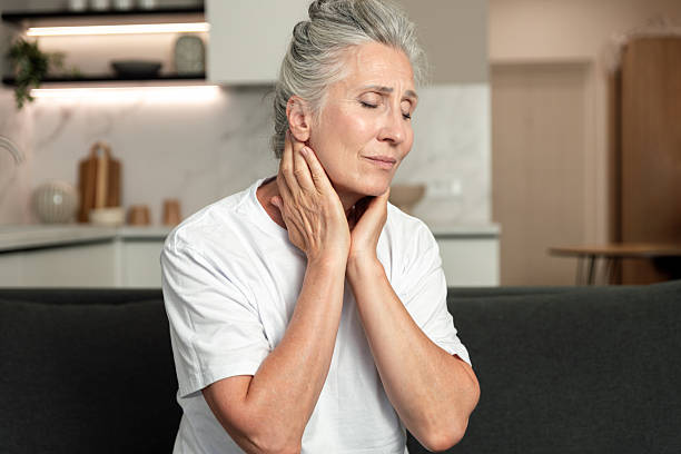 istock Checking neck for sore throat and lymph node issues at home 2253117922