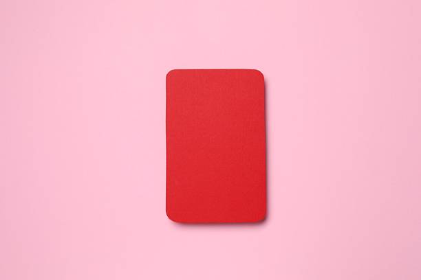istock Red paper card on pink background 2253117934