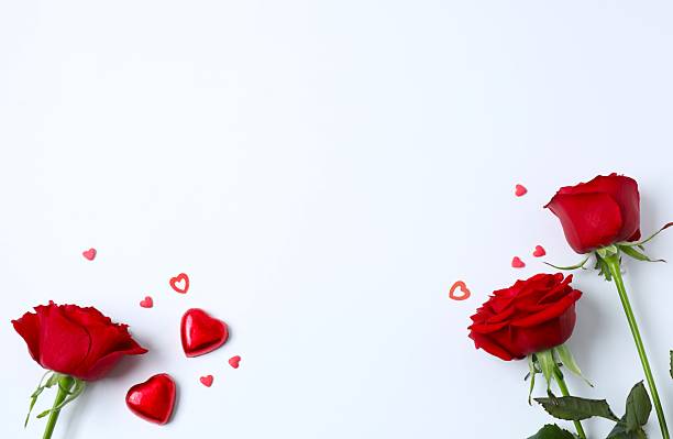 istock Beautiful red roses with hearts on white background 2253117967
