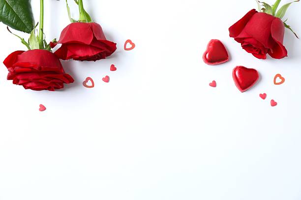 istock Beautiful red roses with hearts on white background 2253117976