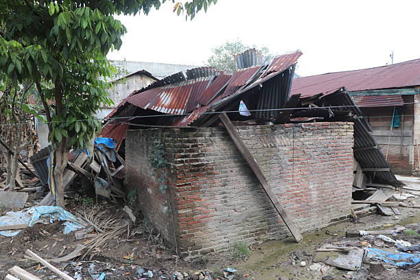 istock Destroyed Building with Collapsed Rusted Metal Roof 2253118980