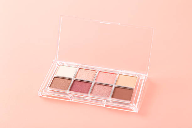 istock Eyeshadow palette on a pink background 2253122563