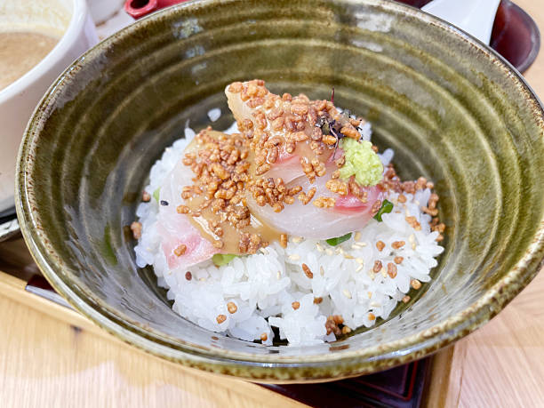 istock Sea bream on rice with green tea 2253126446