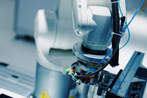 istock The robotic arm is working in the factory. 2253127948