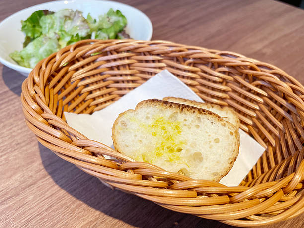 istock Olive oil and sliced baguette 2253128816