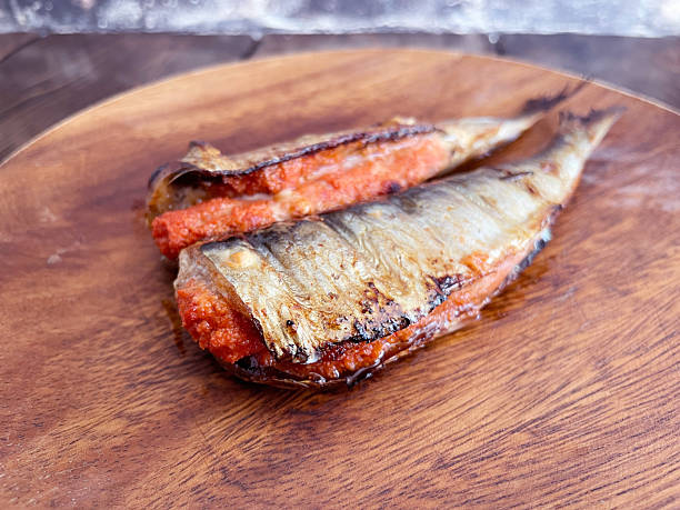 istock Stuff mentaiko into the belly of a sardine 2253129282