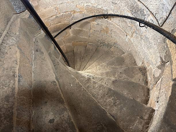 Stone spiral staircase inside an old building