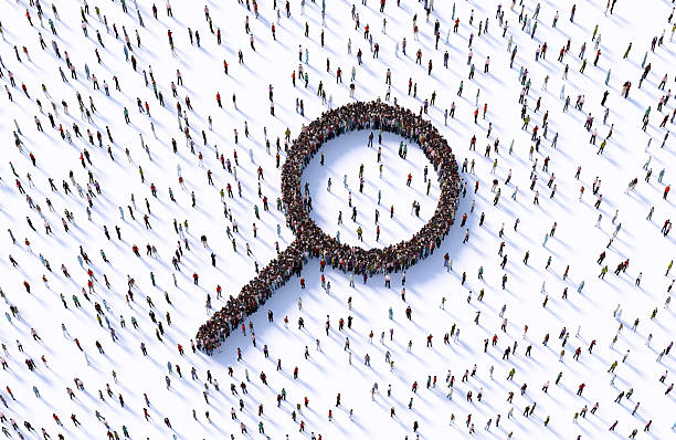 istock Human Crowd Forming A Magnifier Symbol On White Background 2253131708