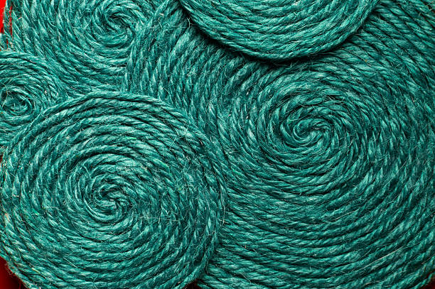 istock A solid background of colorful threads for cross stitch and needlework. Textured background for needlework and design. Rainbow of threads. Rows of colorful embroidery threads. 2253132306