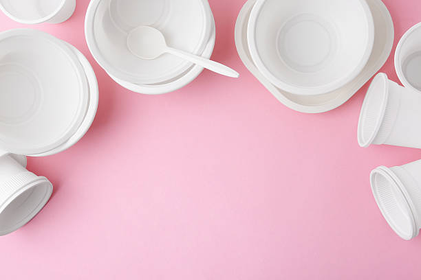 istock Set of disposable plastic tableware on pink background, flat lay. Space for text 2253133337