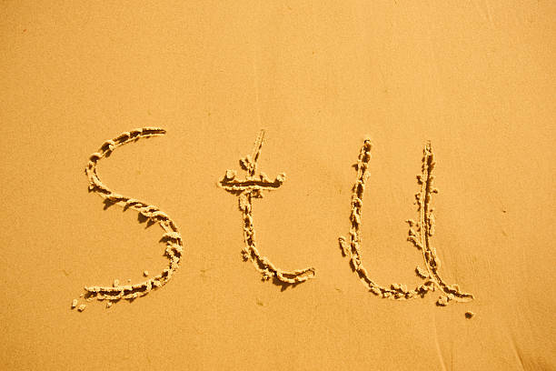 German word for Baltic Sea „Ostsee“ written in the sand by the sea