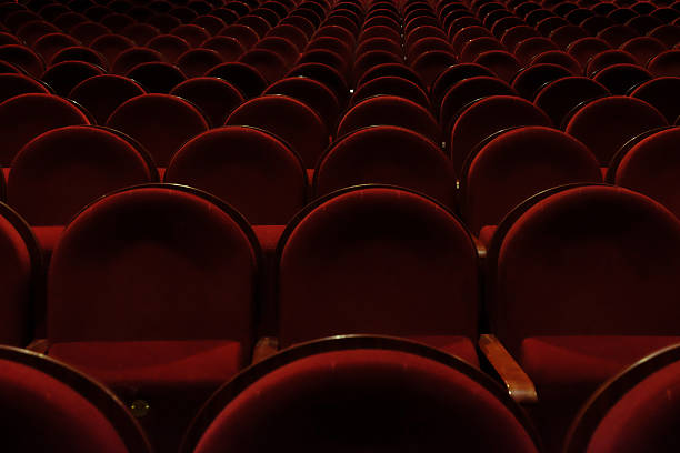 istock numbered theater chairs with red velvet 2253134797
