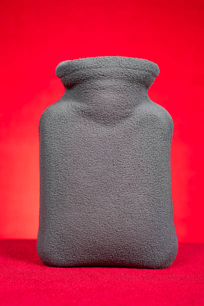 a small hot water bag on red at vertical composition