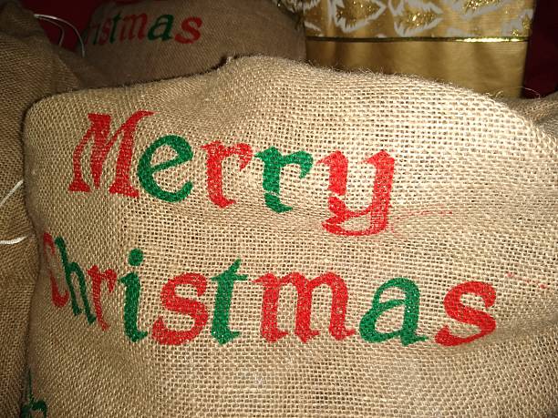istock Merry Christmas Text on Santa’s Gift Bag 2253135929
