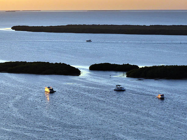 Sunset in the Florida Key with Boats, Docks and iconic sunsets.