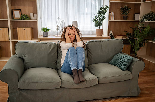 istock Woman suffering from mental stress at home 2253138228