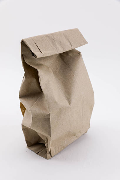 istock Folded Kraft Paper Bag Standing Upright 2253140509
