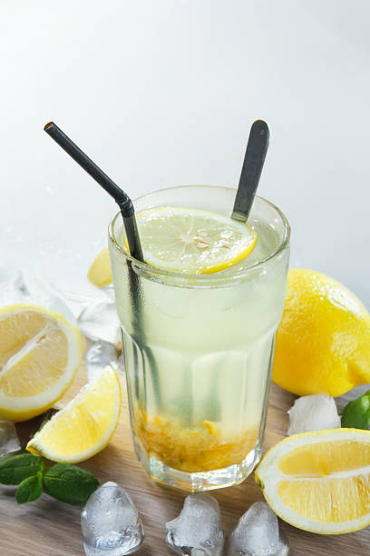 istock Refreshing Lemon Honey Drink in Glass 2253142211