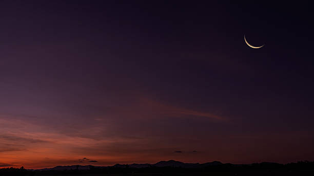 istock Crescent moon on dusk sky twilight after sundown, well free space for text Arabic religious of Islamic Ramadan Kareem, Eid al Fitr, Eid al Adha, Eid Mubarak 2253145106