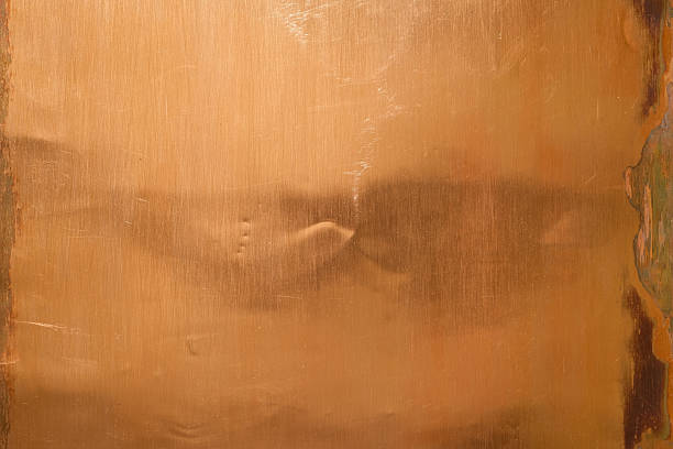 istock Copper background. Thin strips of oxidized copper on both sides of the photo. 2253146111