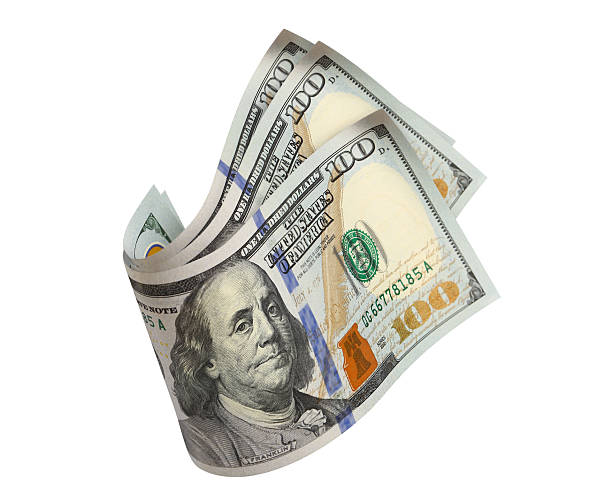 istock Flying hundred dollar bills, isolated on white background 2253148848