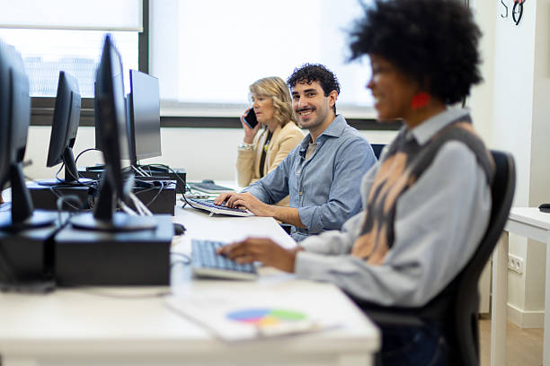 istock Multicultural group of people working in modern office 2253152449