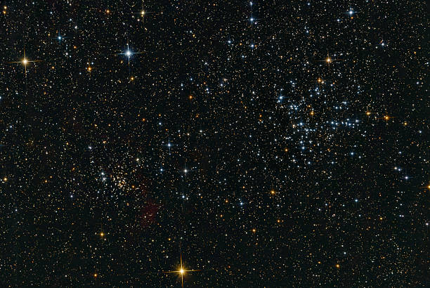 A bright and rich open star cluster in Auriga with numerous hot blue stars and red giants