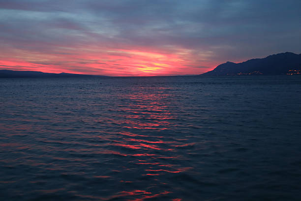 istock Seascape with a Vibrant Sunset Sky: 2253154446
