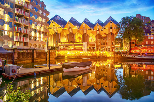 The Old Port with famous Cube houses (Kubuswoningen) on background in Rotterdam, Netherlands